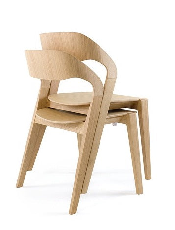 stacked handmade maple chairs